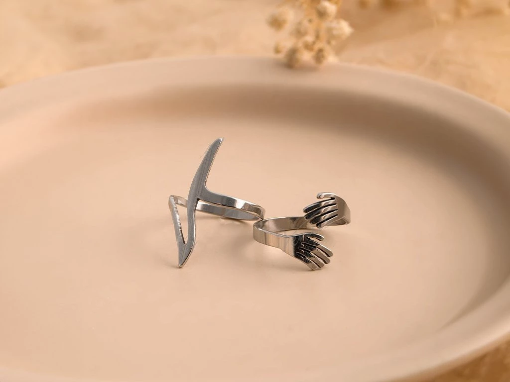 ANILLO ACERO CON FORMA ABRAZO / LATIDO X 1