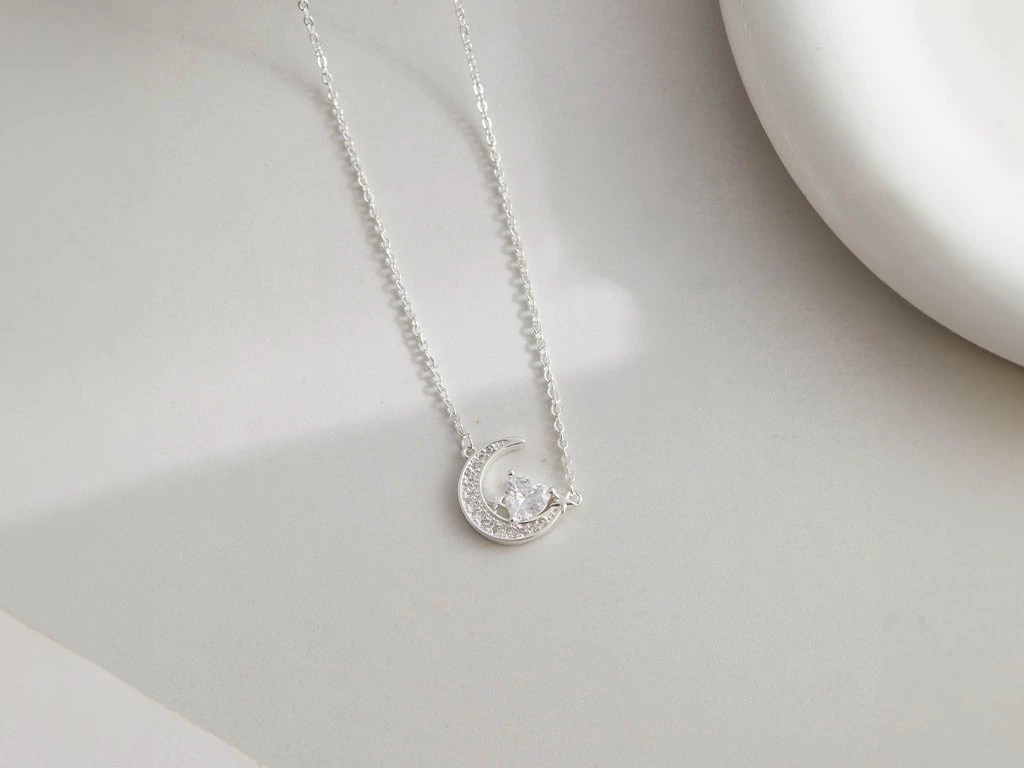 CADENA ACERO BLANCO CON DIJE BRONCE LUNA Y ESTRELLA CUBIC MICROPAVE