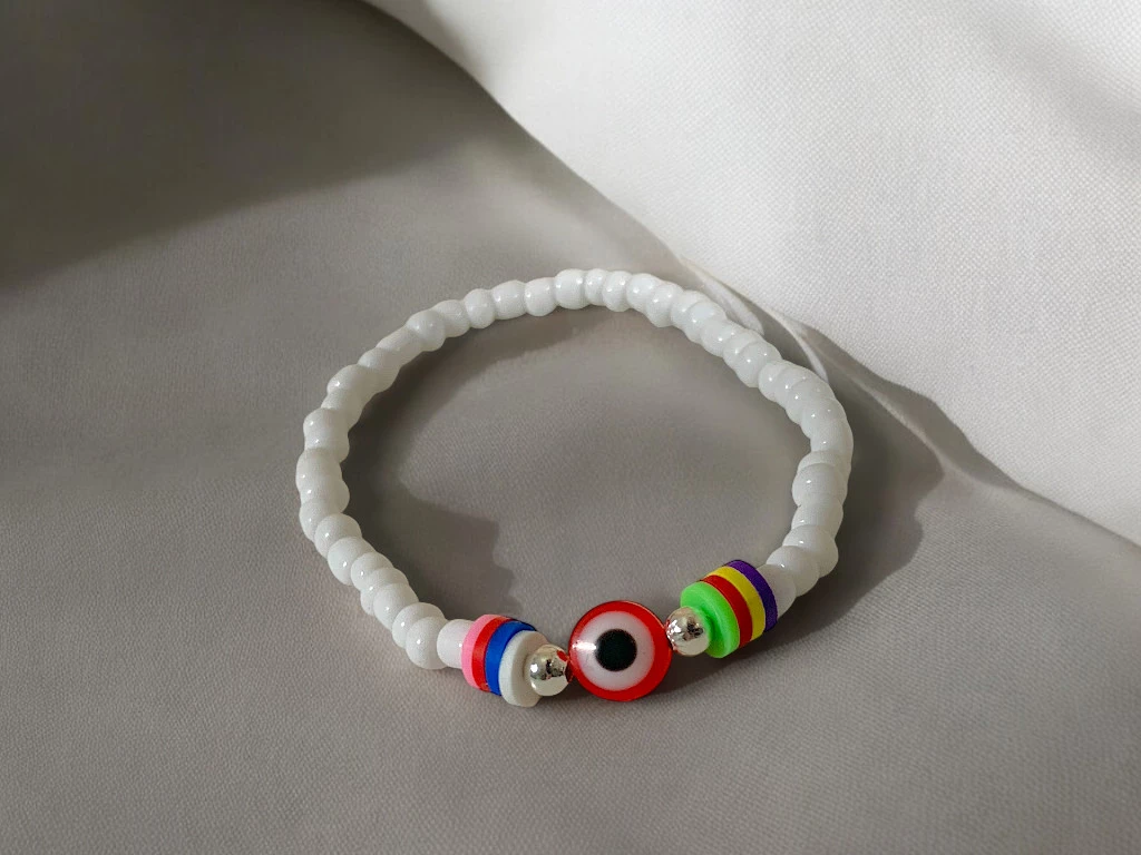 PULSERA OJITO TURCO BLANCA CON DONA COLORES