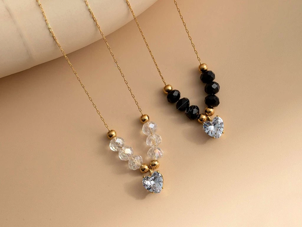 CADENA ACERO DORADO CON CRISTAL Y DIJE CUBIC