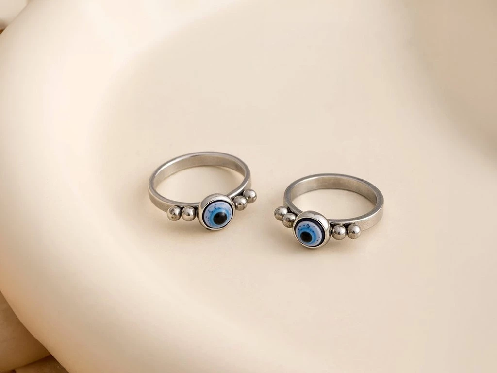 ANILLO ACERO OJITOS X 1 UNIDAD
