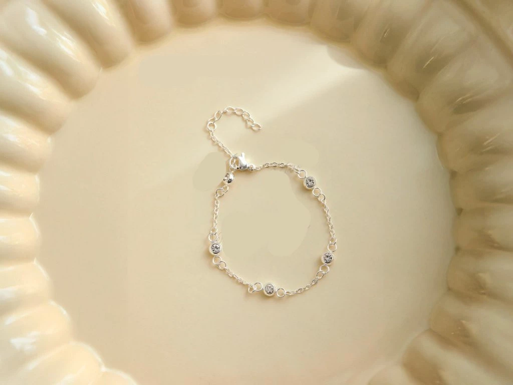 PULSERA ACERO BLANCO CON STRASS INTERCALADO