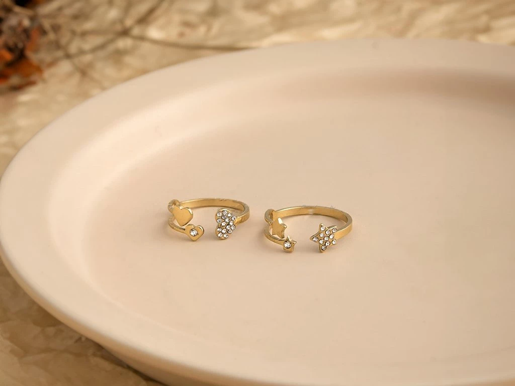 ANILLO ACERO DORADO CORAZON / ESTRELLA CON STRASS